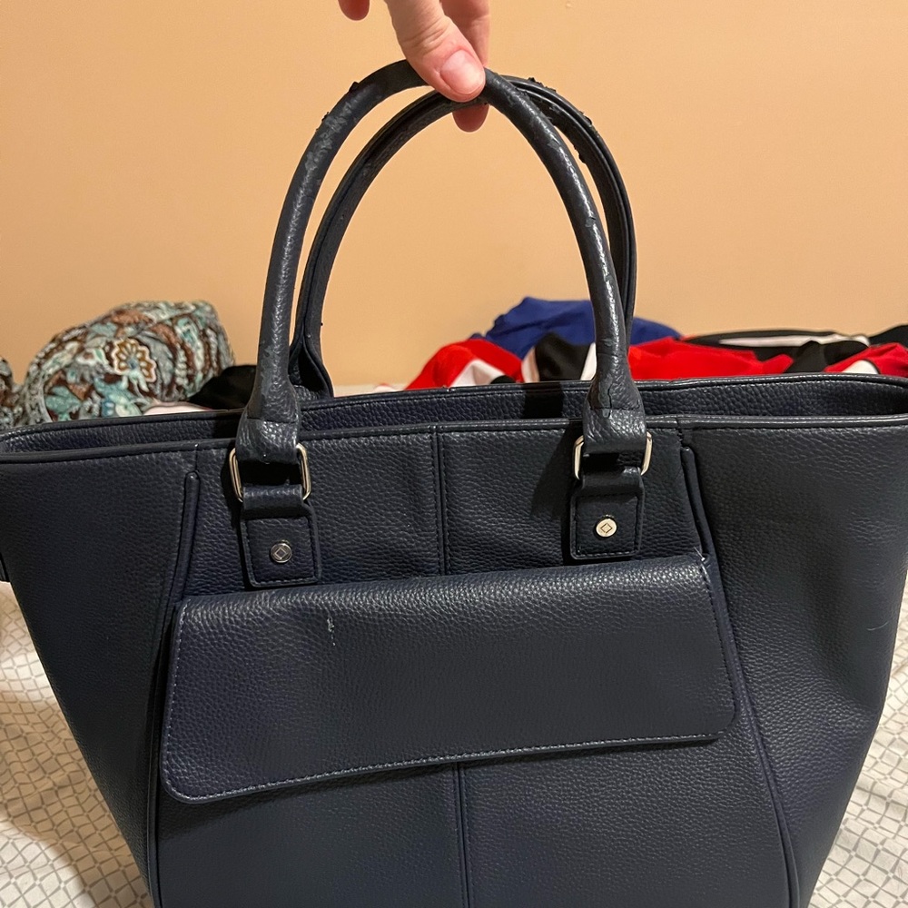 31 brand tote. A little wear and tear on straps but still a lot of life